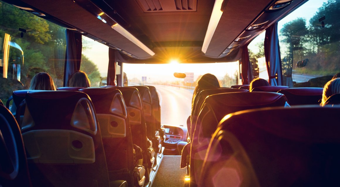 Resenärer i buss. Foto: Shutterstock